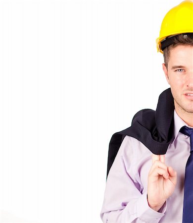 Young construction woker smiling isoalted on white with copyspace Stock Photo - Budget Royalty-Free & Subscription, Code: 400-04131275