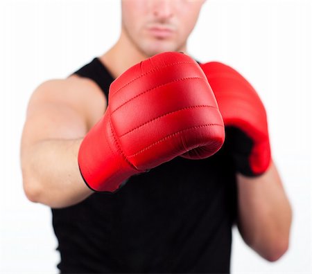 simsearch:400-05880401,k - Young athletic man wearing boxing gloves Stock Photo - Budget Royalty-Free & Subscription, Code: 400-04131305