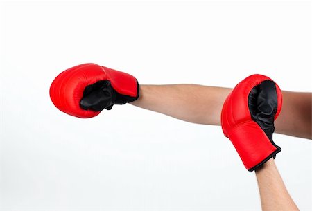 isolated studio shot of a man wearing boxing gloves Stock Photo - Budget Royalty-Free & Subscription, Code: 400-04131303