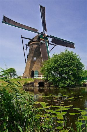 Traditional windmill of the Netherlands. Kinderdijk Stock Photo - Budget Royalty-Free & Subscription, Code: 400-04132171