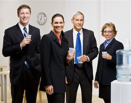 simsearch:400-04129016,k - Business people drinking water at water cooler Stock Photo - Budget Royalty-Free & Subscription, Code: 400-04132737