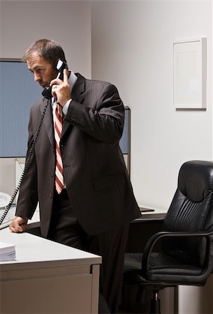 simsearch:400-04129016,k - Businessman talking on telephone Stock Photo - Budget Royalty-Free & Subscription, Code: 400-04132807