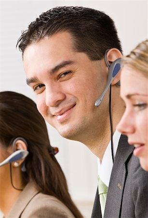 simsearch:400-04129016,k - Business people talking on headsets Stock Photo - Budget Royalty-Free & Subscription, Code: 400-04132891