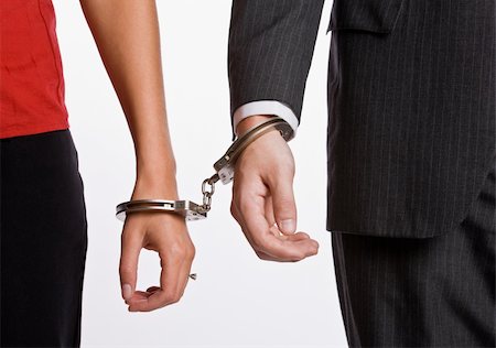Business people handcuffed together Stock Photo - Budget Royalty-Free & Subscription, Code: 400-04132917