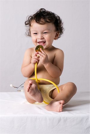 Baby at the doctor,playing with stethoscope. Stock Photo - Budget Royalty-Free & Subscription, Code: 400-04132962