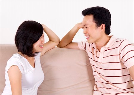 simsearch:400-04151970,k - Happy couple having conversation face to face and looking at each other. Fotografie stock - Microstock e Abbonamento, Codice: 400-04133798