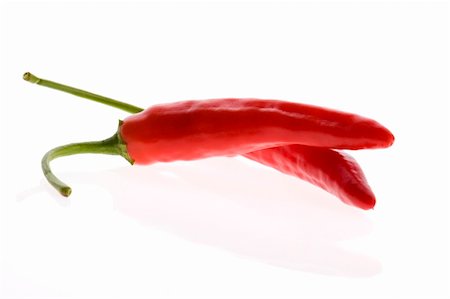 simsearch:400-04185368,k - hot chilli peppers isolated on white Foto de stock - Royalty-Free Super Valor e Assinatura, Número: 400-04144094