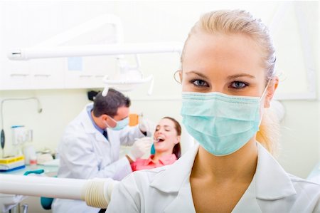happy confident female dentist Foto de stock - Super Valor sin royalties y Suscripción, Código: 400-04144434