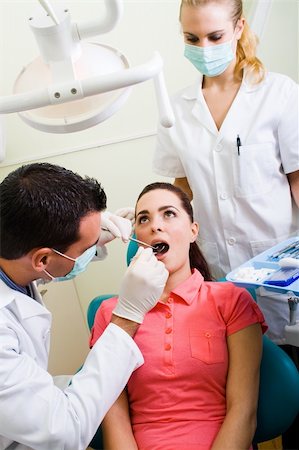 simsearch:400-04309650,k - young female patient visiting dentist for dental checkup Stock Photo - Budget Royalty-Free & Subscription, Code: 400-04144436