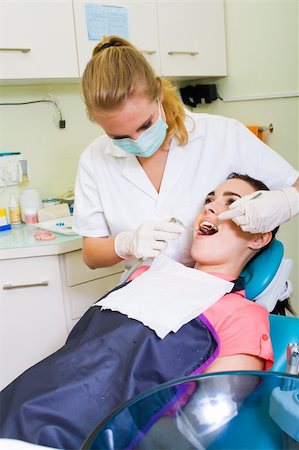 dental operation in dental office Stock Photo - Budget Royalty-Free & Subscription, Code: 400-04144465
