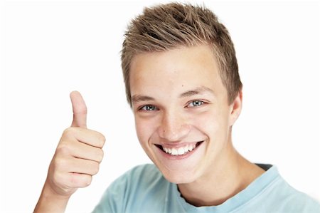 Photo of a young man giving a  thumbs up. Stock Photo - Budget Royalty-Free & Subscription, Code: 400-04144549