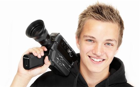 film making - A young photographer with a 8mm camera Stock Photo - Budget Royalty-Free & Subscription, Code: 400-04144542