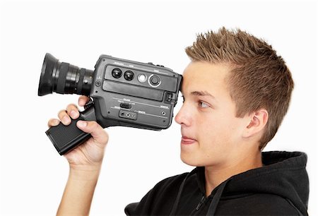 film making - A young photographer with a 8mm camera Stock Photo - Budget Royalty-Free & Subscription, Code: 400-04144543