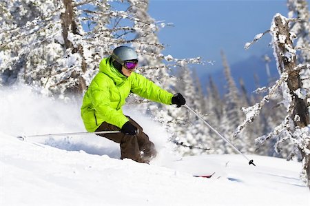 peterkirillov (artist) - Young man on skis riding between trees in powder snow. Freeride Fotografie stock - Microstock e Abbonamento, Codice: 400-04144847