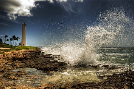 pic palm tree beach big island - HDR photo of a wave crashing into rocky shore, Barber's Point Lighthouse in background, taken on Oahu, Hawaii. Photographie de stock - Aubaine LD & Abonnement, Code: 400-04145673