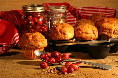 Delicious cranberry muffins with fresh berries on table Stock Photo - Budget Royalty-Free & Subscription, Code: 400-04145790
