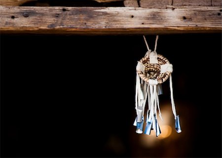 dream catchers - Native American Dream Catcher Suspended from Wooden Beam Stock Photo - Budget Royalty-Free & Subscription, Code: 400-04146000