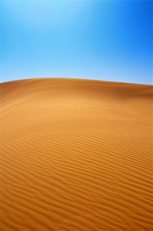 sand dunes and cloudless blue sky Photographie de stock - Aubaine LD & Abonnement, Code: 400-04146471