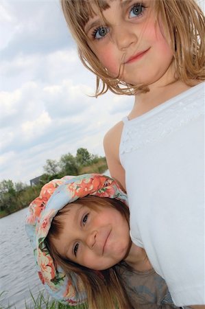 simsearch:400-06087517,k - adorable happy girls friends outdoor on the riverbank Stock Photo - Budget Royalty-Free & Subscription, Code: 400-04147515