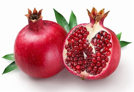 pomegranate on a white background Foto de stock - Royalty-Free Super Valor e Assinatura, Número: 400-04147867