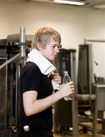 simsearch:400-04149259,k - Young man taking a break at a health club Stock Photo - Budget Royalty-Free & Subscription, Code: 400-04149226