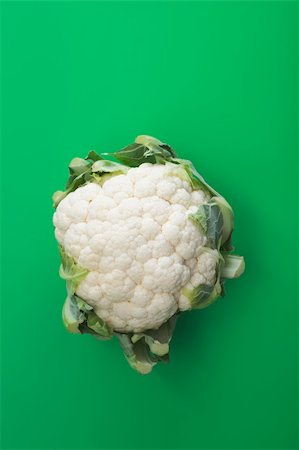 Cauliflower vegetable Brassica oleracea on green background Stock Photo - Budget Royalty-Free & Subscription, Code: 400-04149380