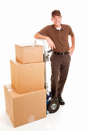 Delivery man or mover resting with a stack of boxes.  Full body isolated on white. Stock Photo - Budget Royalty-Free & Subscription, Code: 400-04149776