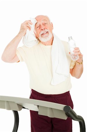 simsearch:400-04136462,k - Fit healthy senior man takes a break from working out to cool down.  Isolated. Foto de stock - Super Valor sin royalties y Suscripción, Código: 400-04149826