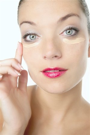 simsearch:400-04821060,k - Beauté closeup portrait d'un rouge lèvres crème cosmétique et de la femme Photographie de stock - Aubaine LD & Abonnement, Code: 400-04140574