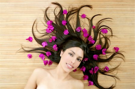 Beautiful indian woman portrait in a beauty spa with bougainvillea flowers Stock Photo - Budget Royalty-Free & Subscription, Code: 400-04140578