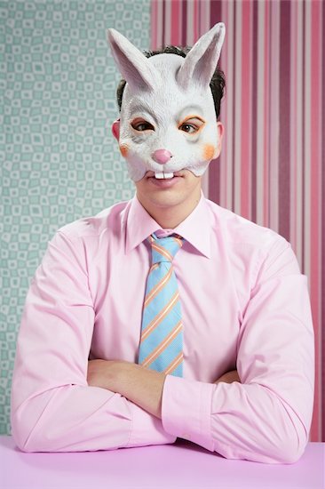 Businessman with funny rabbit mask portrait over wallpaper Stock Photo - Royalty-Free, Artist: lunamarina, Image code: 400-04140624