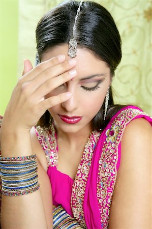 Beautiful indian brunette portrait with traditionl costume Stock Photo - Budget Royalty-Free & Subscription, Code: 400-04140653