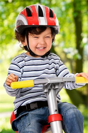 little boy riding bicycle Stock Photo - Budget Royalty-Free & Subscription, Code: 400-04141085