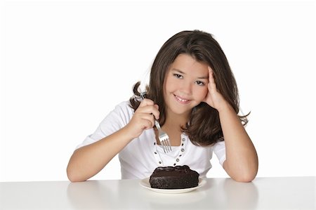 simsearch:400-04637126,k - Süße Kaukasische Kind ein Stück Schokolade Kuchen essen Stockbilder - Microstock & Abonnement, Bildnummer: 400-04141327