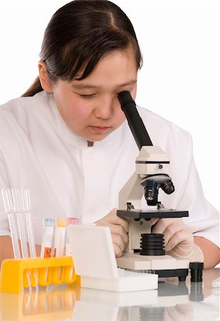 Girl with microscope, isolated on a white background. Stock Photo - Budget Royalty-Free & Subscription, Code: 400-04141532