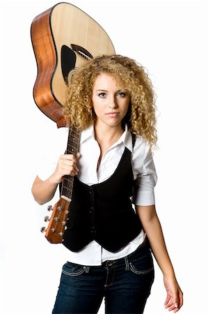 eastwestimaging (artist) - An attractive young teenage woman with an acoustic guitar on white background Fotografie stock - Microstock e Abbonamento, Codice: 400-04142987