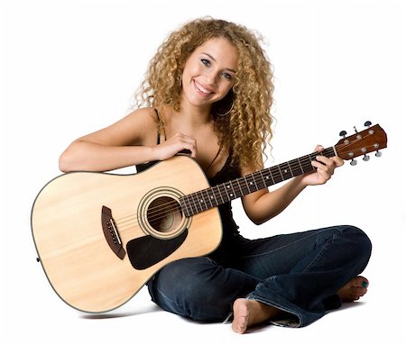 eastwestimaging (artist) - An attractive young teenage woman with an acoustic guitar on white background Fotografie stock - Microstock e Abbonamento, Codice: 400-04143051