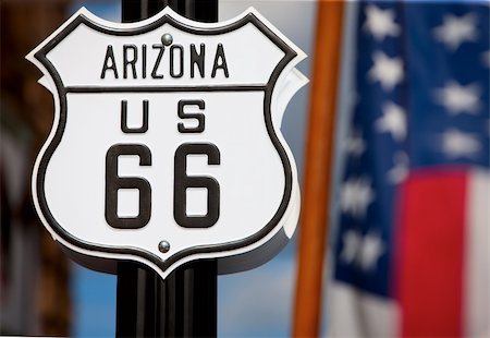 simsearch:400-07955646,k - Route 66 sign on side of road with American flag Stock Photo - Budget Royalty-Free & Subscription, Code: 400-04143766