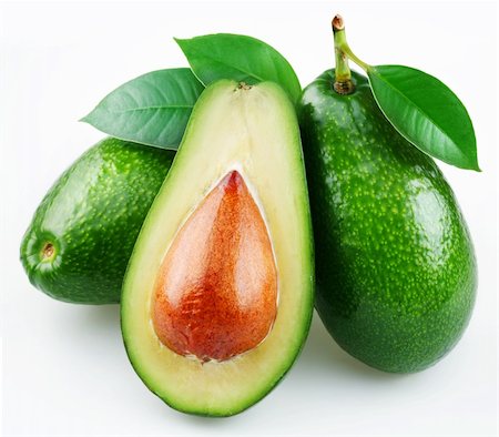 Avocado with leaves on a white background Foto de stock - Royalty-Free Super Valor e Assinatura, Número: 400-04154110