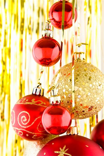 Christmas baubles hanging over a white and background Stock Photo - Royalty-Free, Artist: Spanishalex, Image code: 400-04154201