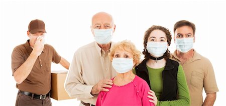 Family wearing surgical masks to protect from an epidemic, as a delivery man with the flu approaches.  Banner isolated on white. Stock Photo - Budget Royalty-Free & Subscription, Code: 400-04154466