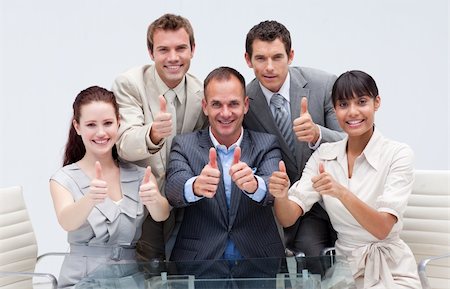 simsearch:400-04187718,k - Confident business team with thumbs up in the office Foto de stock - Royalty-Free Super Valor e Assinatura, Número: 400-04154679