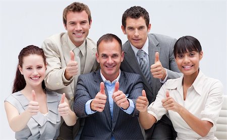 simsearch:400-04187718,k - Happy business team with thumbs up in the office Foto de stock - Royalty-Free Super Valor e Assinatura, Número: 400-04154680