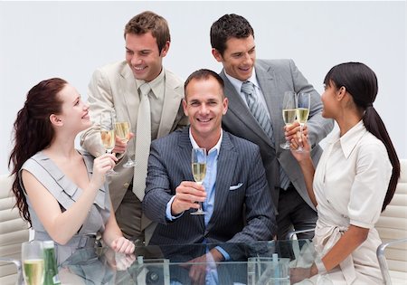 simsearch:400-04187718,k - Happy business team toasting with champagne in the office Foto de stock - Royalty-Free Super Valor e Assinatura, Número: 400-04154705