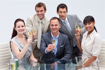 simsearch:400-04187718,k - Happy business team toasting with champagne in the office Foto de stock - Royalty-Free Super Valor e Assinatura, Número: 400-04154706