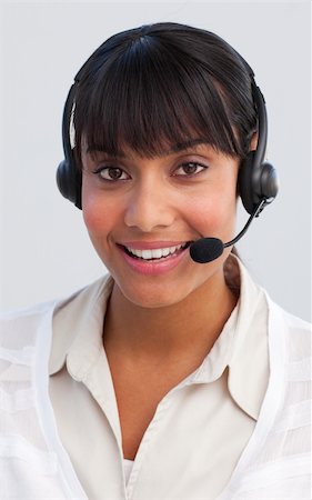 simsearch:400-03990860,k - Beautiful ethnic young businesswoman working in a call center Photographie de stock - Aubaine LD & Abonnement, Code: 400-04154729