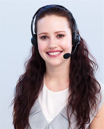 simsearch:400-03990860,k - Portrait of smiling beautiful woman working in a call center Photographie de stock - Aubaine LD & Abonnement, Code: 400-04154723