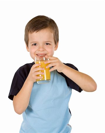 simsearch:400-04218582,k - Healthy happy boy holding a glass of fresh fruit juice - isolated Stockbilder - Microstock & Abonnement, Bildnummer: 400-04154935