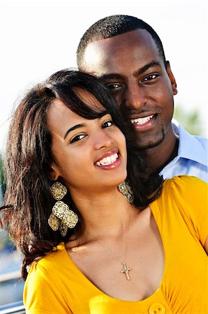 Portrait of young romantic couple standing at harbor Stock Photo - Budget Royalty-Free & Subscription, Code: 400-04155055