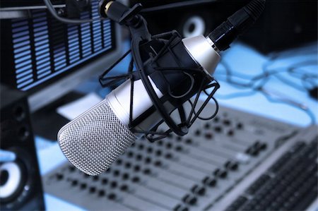 simsearch:400-04694633,k - A mic in front of the control panel in broadcasting studio Stock Photo - Budget Royalty-Free & Subscription, Code: 400-04155139
